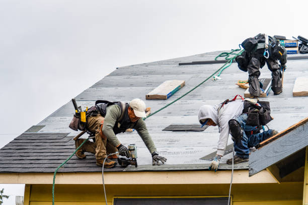Professional Gutter Installation technician working in Parshall, ND